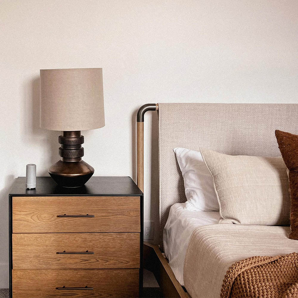 Curated antique and modern furnishings selected for a transitional home downsized design